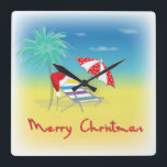 Merry Christmas, Santa Hat, Palm Tree, Beach Quadratische Wanduhr<br><div class="desc">Merry Christmas with Santa Hat,  Palm Tree,  Beach Umbrella and Chair Illustration by Inge Lewis.  Find more matching items at the ingeinc.com store.</div>