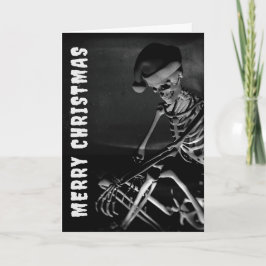 Merry Christmas. Skeleton with Santa hat Karte