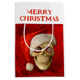 Merry Christmas. Skull wearing Santa hat Mittlere Geschenktüte