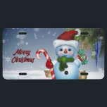 Merry Christmas Snowman License Plate US Nummernschild<br><div class="desc">Auf dieser Urlaubslizenz wird ein niedliches Bild eines Schneemanns gezeigt,  der einen Bonbonhut trägt. Mit der Nachricht "Frohe Weihnachten",  nutzen Sie sich selbst oder geben Sie als Urlaubsgeschenk auch!</div>