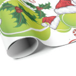 Merry Christmas Tennis Ball Santa Geschenkpapier<br><div class="desc">Sportliebhaber Weihnachten - Tennisball mit Santa Cap dekoriert mit Heiligen und Candy Canes - Kundenspezifische Weihnachtsnachten _ Wir wählten Frohe Weihnachten und Ho Ho Ho in rot und grün - Sie können den Text ändern</div>