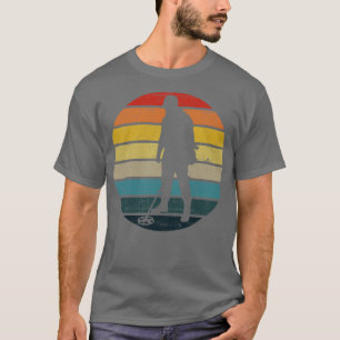 Metalldetektor-Silhouette auf einem abgenutzten Re T-Shirt