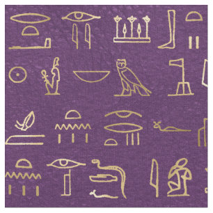 Metallische ägyptische Hieroglyphen auf Lila Stoff