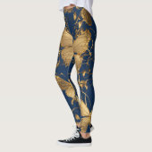 Metallische blaue Schmetterlinge mit Goldweinen Leggings (Links)