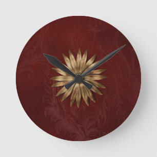 Metallische Gold-Blume auf rotem Stoff Runde Wanduhr