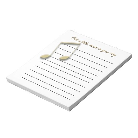 Metallische Gold-Musiknoten auf der Pad Notizblock (Rotiert)