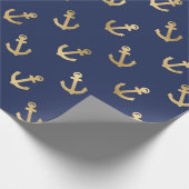 Metallische Goldanker auf dem Navy Blue Geschenkpapier (Ecke)