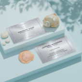 Metallsilber, grauer Hintergrund und blaue Grenze Visitenkarte