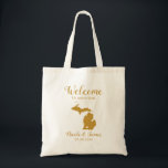 Michigan Map Wedding Welcome Bag, Gold Tragetasche<br><div class="desc">Hochzeitswochenende Begrüßungsgeschenktasche für Gäste aus der Stadt,  um Ihre Hochzeit,  mit dem Bild von Michigan,  mit Herz können Sie an der genauen Stelle platzieren. Fülle die Tasche mit deinen Lieblingsgoodies.</div>