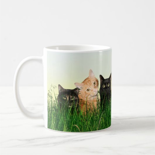 Miezekatzekatzen im Gras Kaffeetasse (Links)