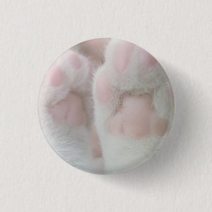 Miezekatzetatzenknopf Button