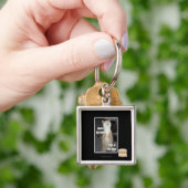 Milliamperestunden-Bauch hat ein glückliches Schlüsselanhänger (Hand)