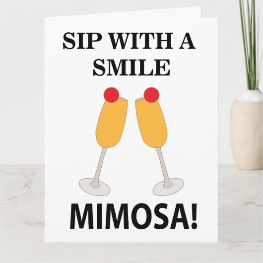 Mimosa Sip mit einem lächelnden Mimosa Karte (Vorderseite)