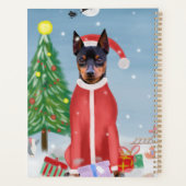 Miniatur Pinsch Hund im Schnee mit Weihnachtsgesch Planer (Rückseite)