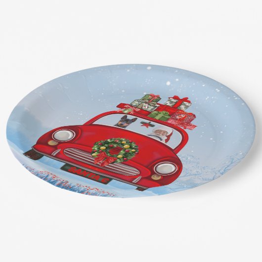 Miniatur Pinscher Hund in Auto mit dem Weihnachtsm Pappteller (Schrägansicht)