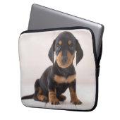 MiniaturDackel-Sitzen Laptopschutzhülle (Vorderseite Links)