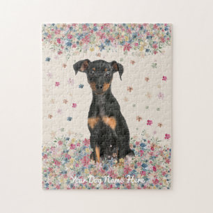 Miniaturpinscher mit unropfen Ohren und unocke Puzzle