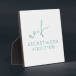 Minimale WiFi-Kennwortsignierung Fotoplatte<br><div class="desc">Behalt deine Gäste mit dieser stilvollen Minimal WiFi Password Sign Plaque verbunden. Diese Plakette besticht durch ein schlichtes und dennoch modernes Design mit einem eleganten, türkisfarbenen Schriftart auf schlichtem, weißem Hintergrund. Es ist ideal, um Ihr WiFi-Passwort so anzuzeigen, dass es sowohl funktionell als auch dekorativ ist. Die Größe 5, 25x5,...</div>