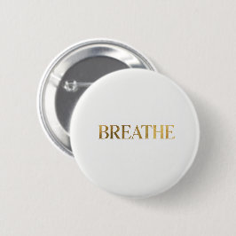 Minimalist typography with gold word breathe button