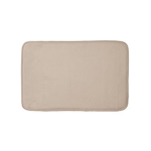 Minimalistisch beigefarbener, schlichter, elegante badematte