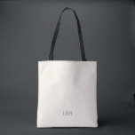 Minimalistische Monogram Bridesmaid Totbeutel Tasche<br><div class="desc">Ein Geschenk,  das sie überall tragen werden - buchstäblich. Diese Elfenbeintotentasche mit einem sauberen grauen Monogramm ist geräumig genug für Hochzeitsessentials und schicken genug für Alltagserfordernisse. Eine personalisierte Brautjungfrau,  die so praktisch wie schön ist.</div>