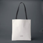 Minimalistische Monogram Bridesmaid Totbeutel Tasche<br><div class="desc">Ein Geschenk,  das sie überall tragen werden - buchstäblich. Diese Elfenbeintotentasche mit einem sauberen grauen Monogramm ist geräumig genug für Hochzeitsessentials und schicken genug für Alltagserfordernisse. Eine personalisierte Brautjungfrau,  die so praktisch wie schön ist.</div>