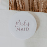 Minimalistische Rose Gold Bridesmaid Brautparty Button<br><div class="desc">Diese minimalistische Rose goldene Bridesmaid Brautparty-Taste ist perfekt für einen einfachen Polterabend. Das moderne romantische Design besticht durch klassische Rose-Gold- und Weißtypografie gepaart mit einer rustikalen und eleganten Kalligraphie mit Vintagem handgeschriebenem Stil. Anpassbar in jeder Farbe. Behalt das Design einfach und elegant, wie es ist, oder personalisiere es durch Hinzufügen...</div>