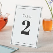 Minimalistische Schwarz-Weiß-Tischnummer Sockelschild (In Situ)