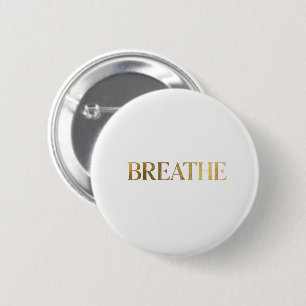 Minimalistische Typografie mit dem goldenen Wort a Button