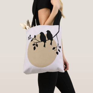 Minimalistische Vögel auf einem Ast mit beiger Son Tasche