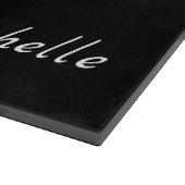 Minimalistische weiße Katze auf schwarzem Namen Schneidebrett (Ecke)