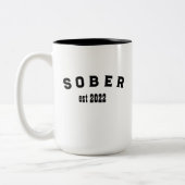 Minimalistischer Kaffee in Schwarz und Weiß Zweifarbige Tasse (Links)