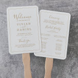 Minimalistisches Goldhochzeitsprogramm Fächer<br><div class="desc">Dieser minimalistisch goldene Hochzeitsprogramm Handfan ist perfekt für eine einfache Hochzeit. Das moderne romantische Design besticht durch klassische Goldtypografie und Weiß, gepaart mit einer rustikalen und eleganten Kalligraphie mit Vintagem handgeschriebenem Stil. Anpassbar in jeder Farbe. Behalt das Design einfach und elegant, wie es ist, oder personalisiere es durch Hinzufügen von...</div>