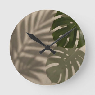 Minimalistisches grünes Monstera-Blatt Tropischer  Runde Wanduhr