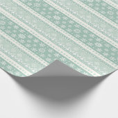 Minimalistisches Schneeflockenmuster auf Mint Gree Geschenkpapier (Ecke)