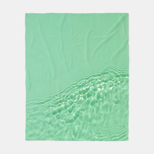 Minzblau gefärbte klare Wasseroberflächentextur mi Fleecedecke (Vorderseite)