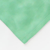 Minzblau gefärbte klare Wasseroberflächentextur mi Fleecedecke (Ecke)