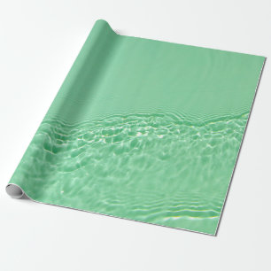 Minzblau gefärbte klare Wasseroberflächentextur mi Geschenkpapier