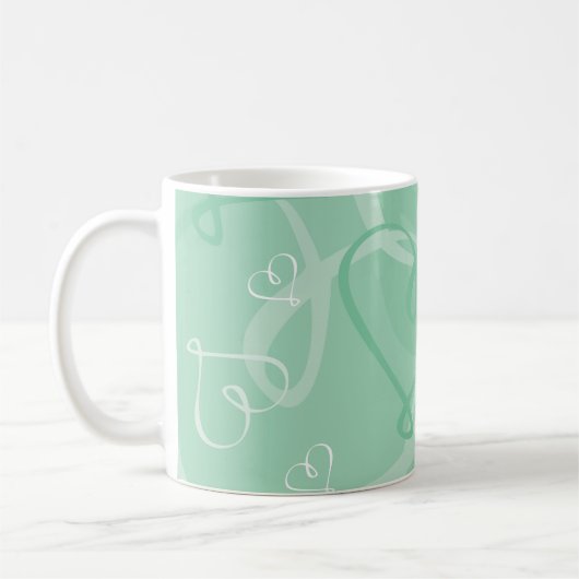 Minzgrünes Herzmuster Kaffeetasse (Links)