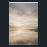 Misty Lake Sunrise Golden Reflection Poster<br><div class="desc">Soft golden sunlight pierces through thick morning mist over a calm lake, creating a luminous path of reflection across the water. Tall reeds line the shore while distant trees fade into the haze, and the sky blends warm peach and rose tones into pale blue-gray. The composition radiates profound stillness, gentle...</div>