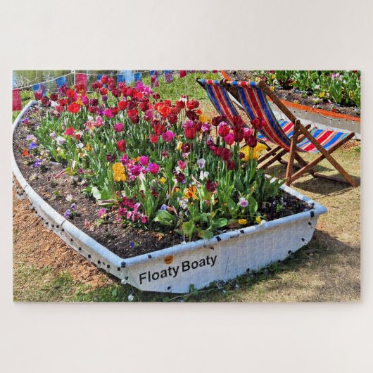 Mit Blumen gefülltes Boot am See Puzzle (Horizontal)