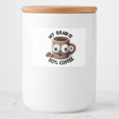 Mit dem Kern-Cartoon-Kaffee-Tasse koffeiniert Lebensmitteletikett (Vorderseite)