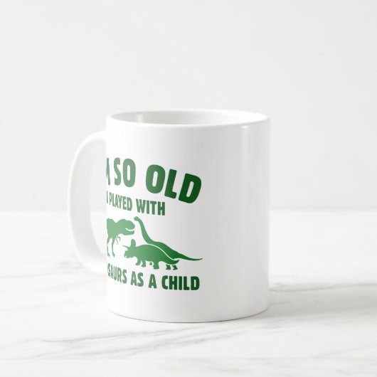 Mit Dinosauriern gespielt Kaffeetasse (Vorderseite Links)