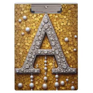 Mit Juwelen besetzter Buchstabe A auf goldenem Mos Klemmbrett