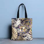 Mit Monogramm Tropengoldseavy Tasche<br><div class="desc">Dieses moderne Design zeichnet sich durch ein Monogramm auf einem Hintergrund eines tropischen Blumenmusters in Gold und Marineblau aus. #floral #tropical #navy #navyblue #gold #golden #botanical #foliage #personalisiert #monogram #mit Monogramm #initial #elegant #chic #stylish #modern #girine #feminine#Tasche #bags #accessoires #office #work #school #giftsforher #personalisiergeschenke</div>