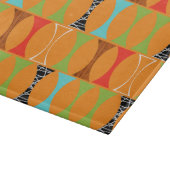 Mitte- des Jahrhundertsmodernes orange Schneidebrett (Ecke)