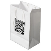 Mittlere Bag mit QR-Code für die Werbeaktion von M Mittlere Geschenktüte (Rückseite Schrägansicht)