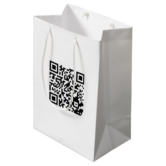 Mittlere Bag mit QR-Code für die Werbeaktion von M Mittlere Geschenktüte (Vorderseite Schrägansicht)
