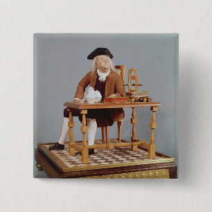 Modell von Benjamin Franklin an seinem Tisch Button
