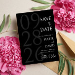 Modern Black and White Minimalist Wedding Save The Date<br><div class="desc">Announce your special day with timeless elegance using the Modern Black and White Minimalist Wedding Save The Date, designed for couples who appreciate clean design and sophisticated simplicity. Featuring a classic black and white color palette with a refined minimalist layout, this save the date card highlights your names and wedding...</div>